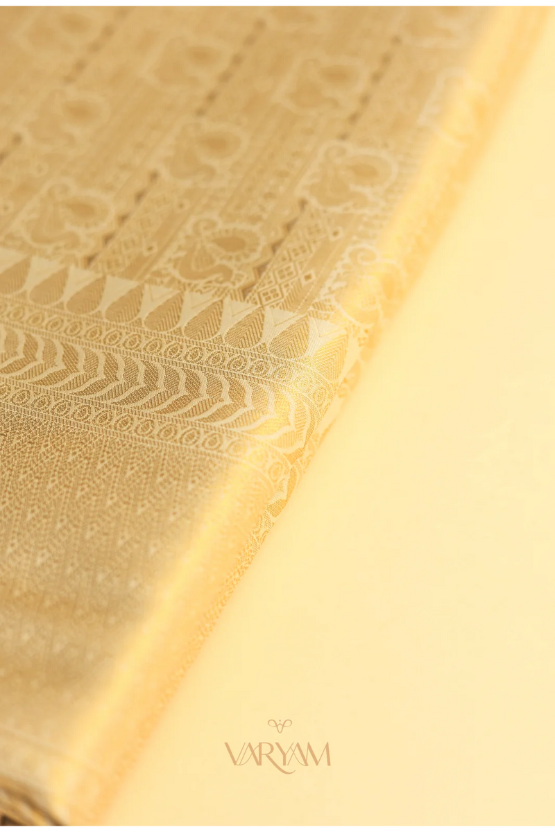 Swarna Silk Cream Gold Saree