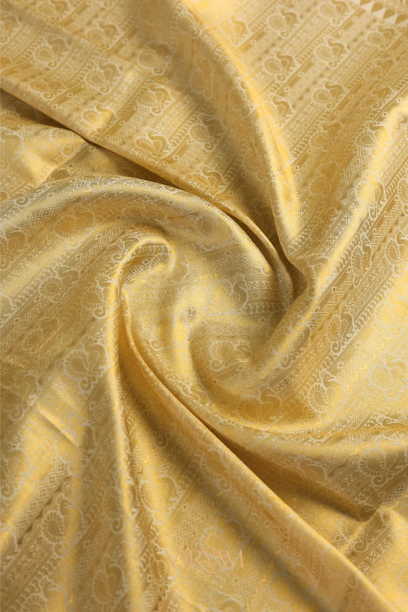 Swarna Silk Cream Gold Saree