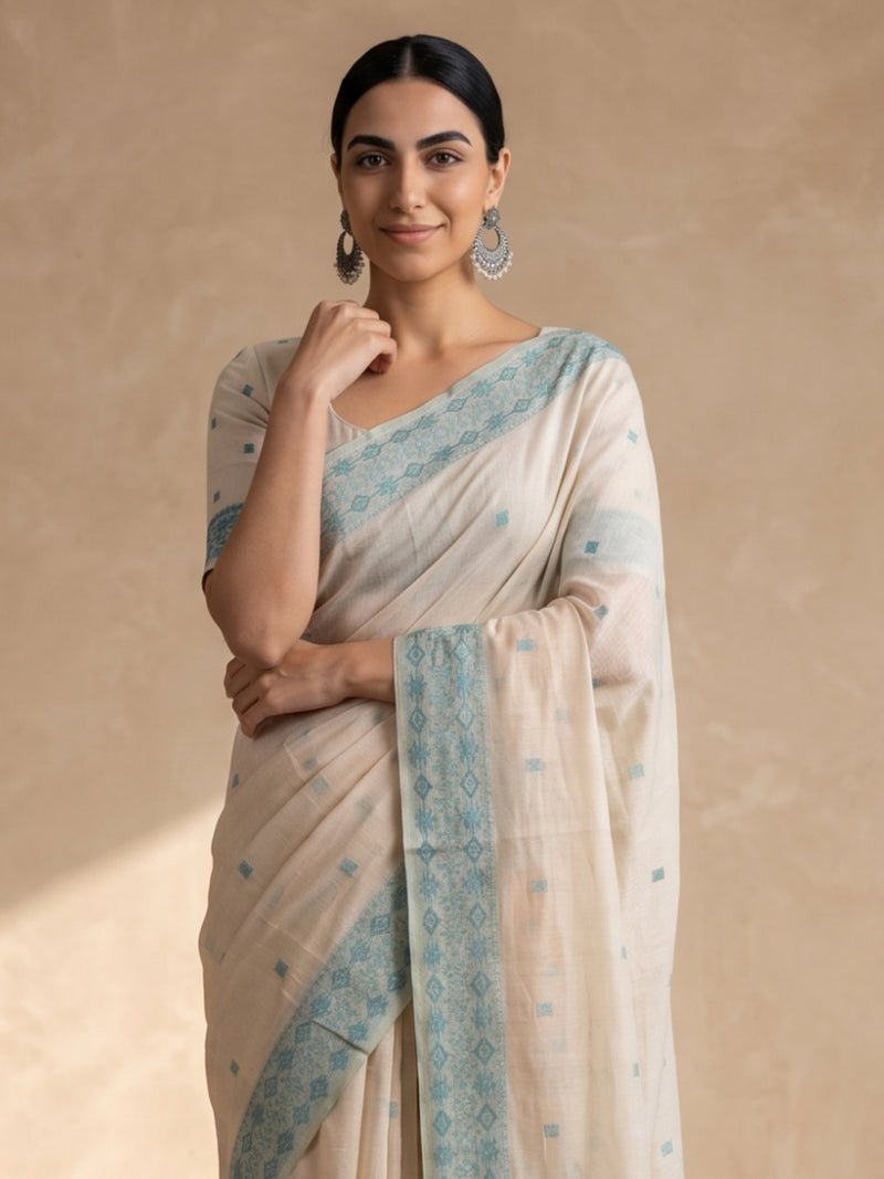 Ira Cream Teal Blue Cotton Saree