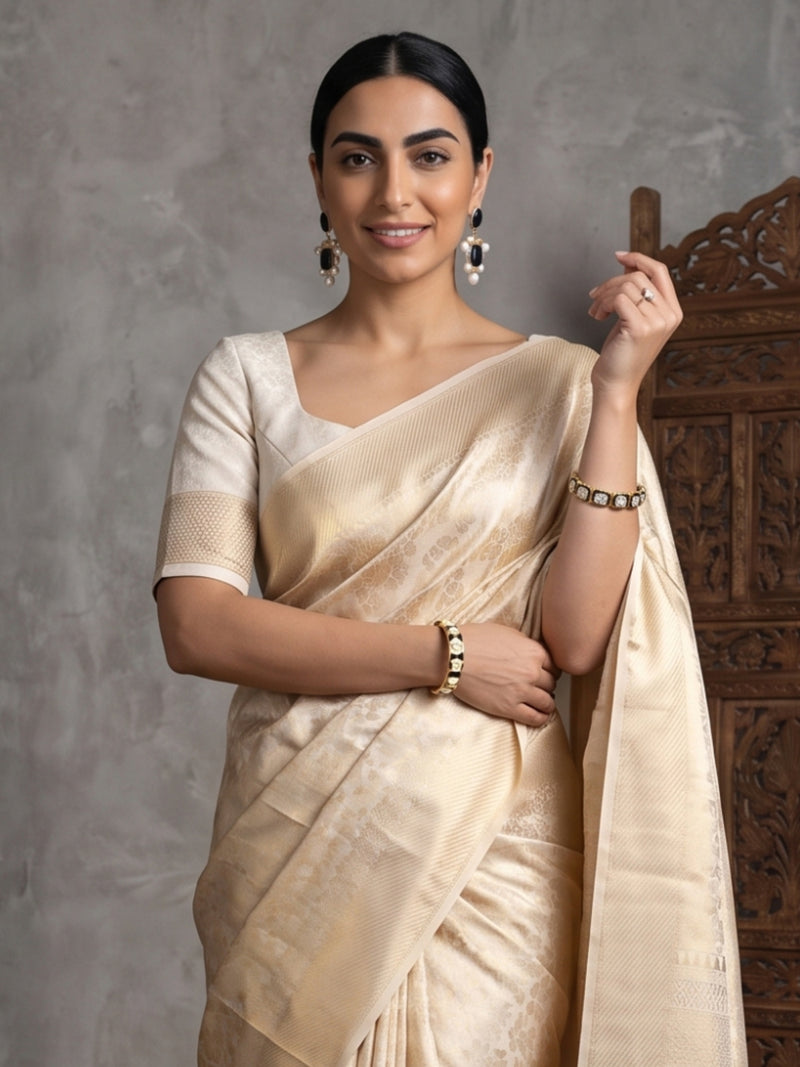 Swarna Silk Cream Gold Saree