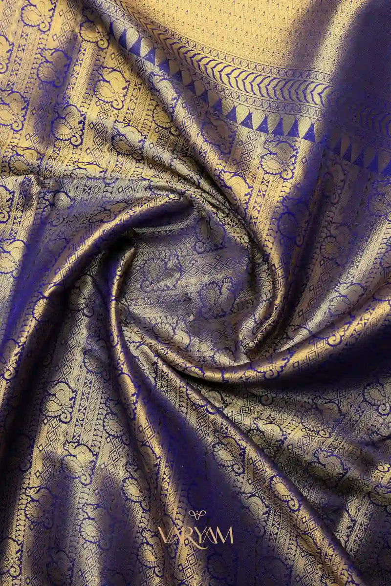 Swarna Silk Voilet Gold Saree