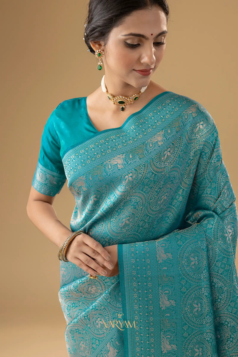 Zoya Silk Teal Blue Saree